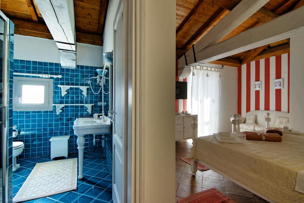Domus Corallia-Luxury Rooms Porto Rotondo Rum bild